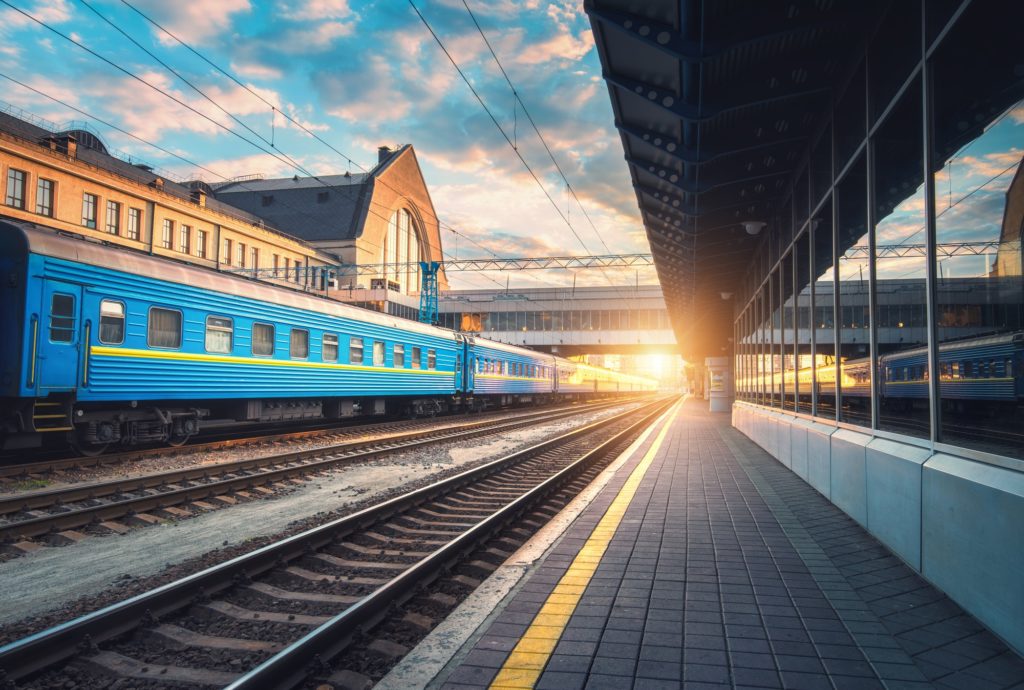 Beautiful blue passenger train at the railway station