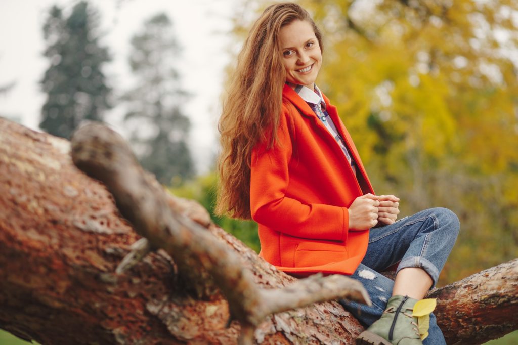 Smiling girl autumn portrait.