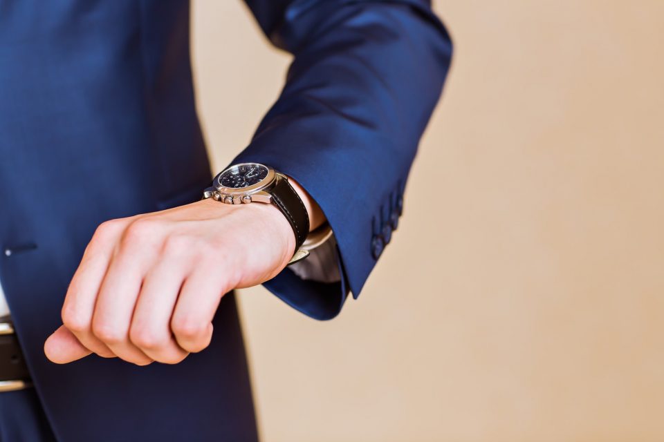 men's hand with a watch.