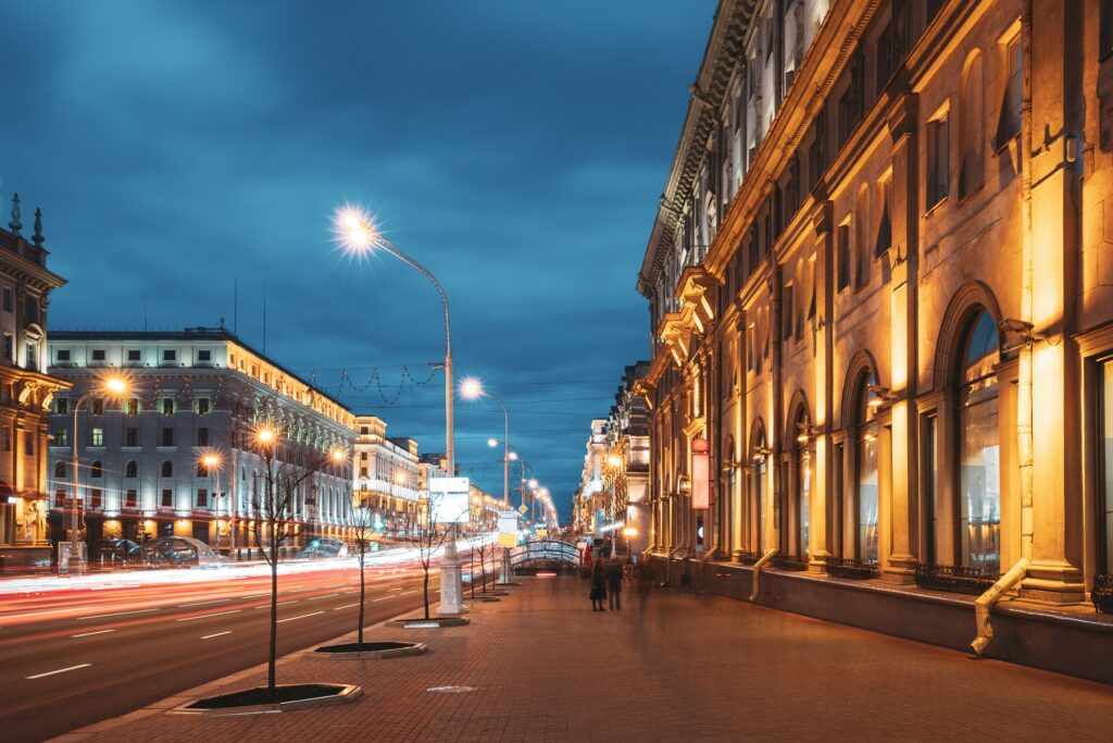 Minsk, Belarus. Traffic On Independence Avenue In Evening Night