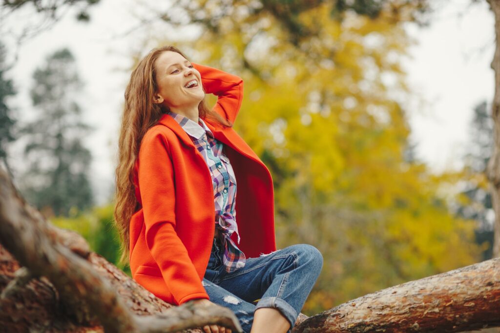 Smiling girl autumn portrait.