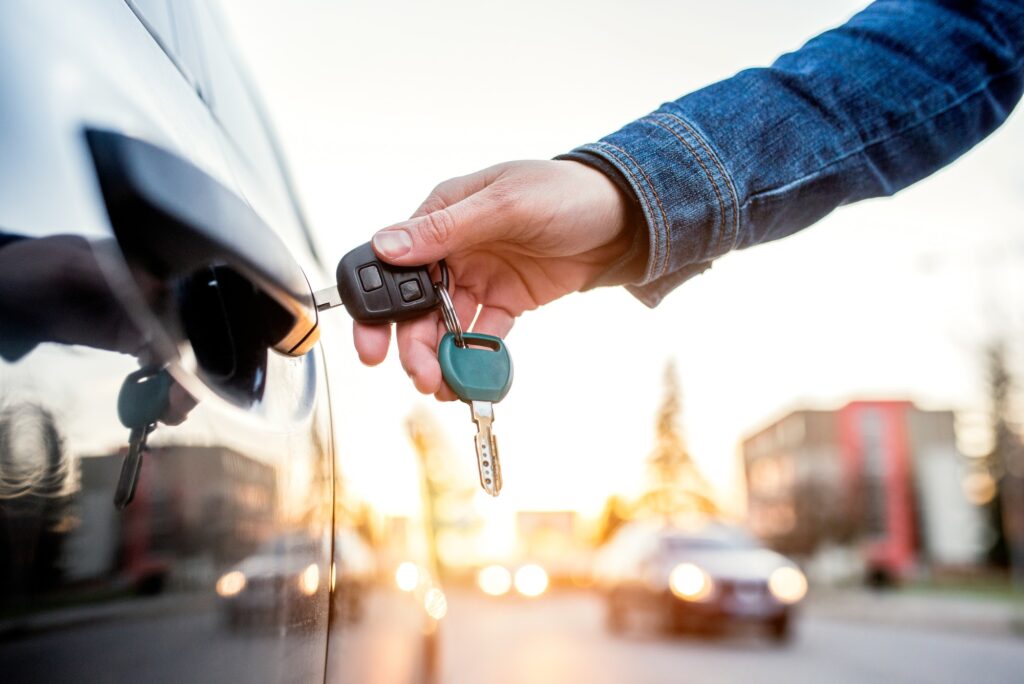 Woman with car key