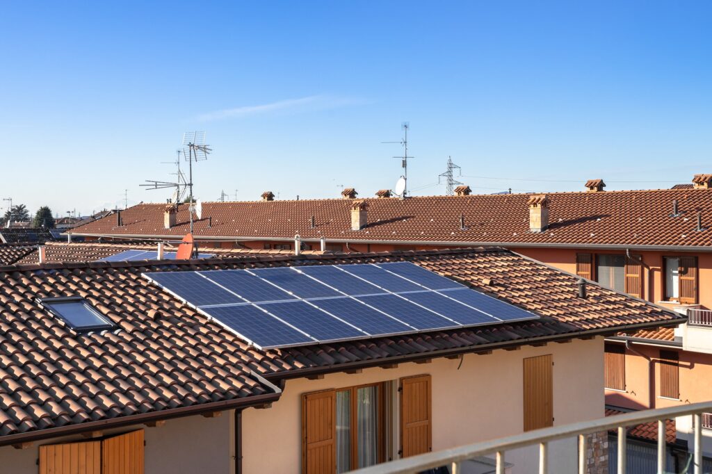 Solar panel on a red roof