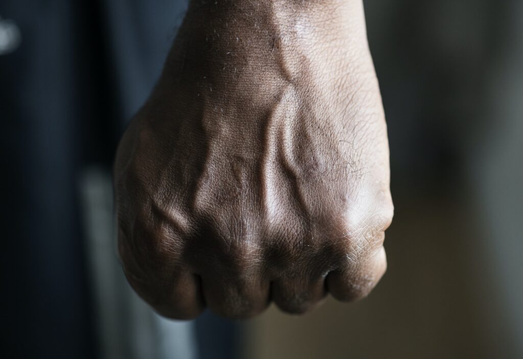 Closeup of a black hand in fist