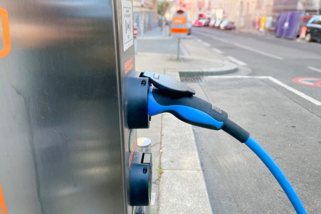 Electric Car charging station on sidewalk